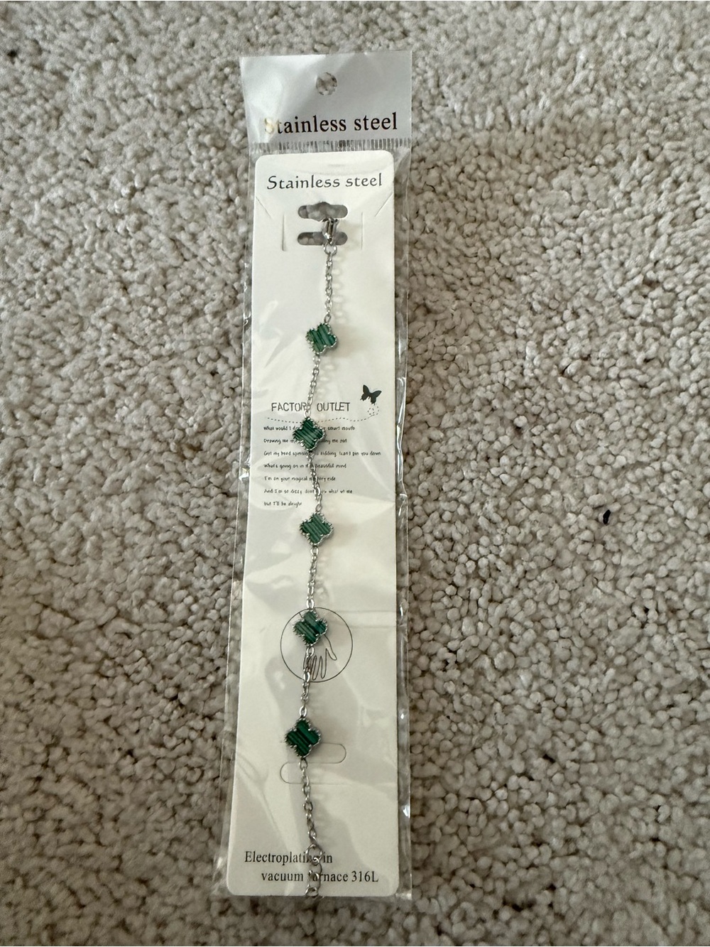 Stainless Steel Bracelet with Green Gem Accents